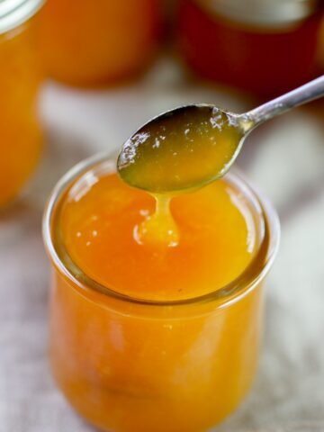 Peach marmalade in a glass jar