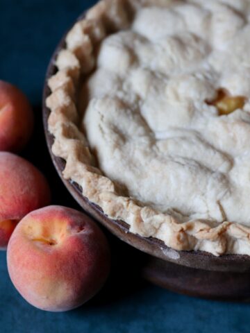 a peach pie with peaches