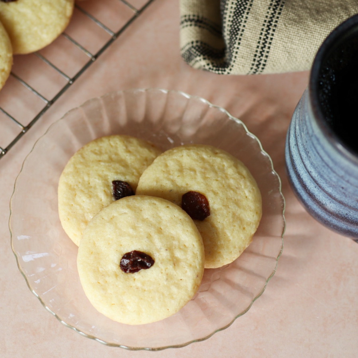 a plate of 1800's Connecticut Cookies with coffee