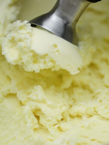 scooping vanilla ice cream from an 1881 recipe