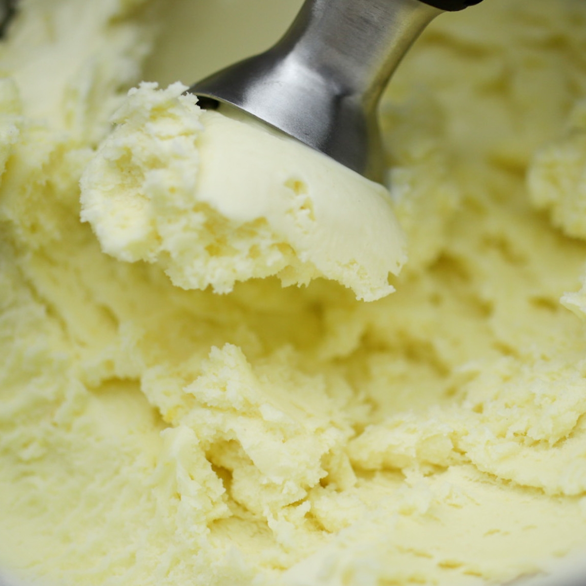 scooping vanilla ice cream from an 1881 recipe