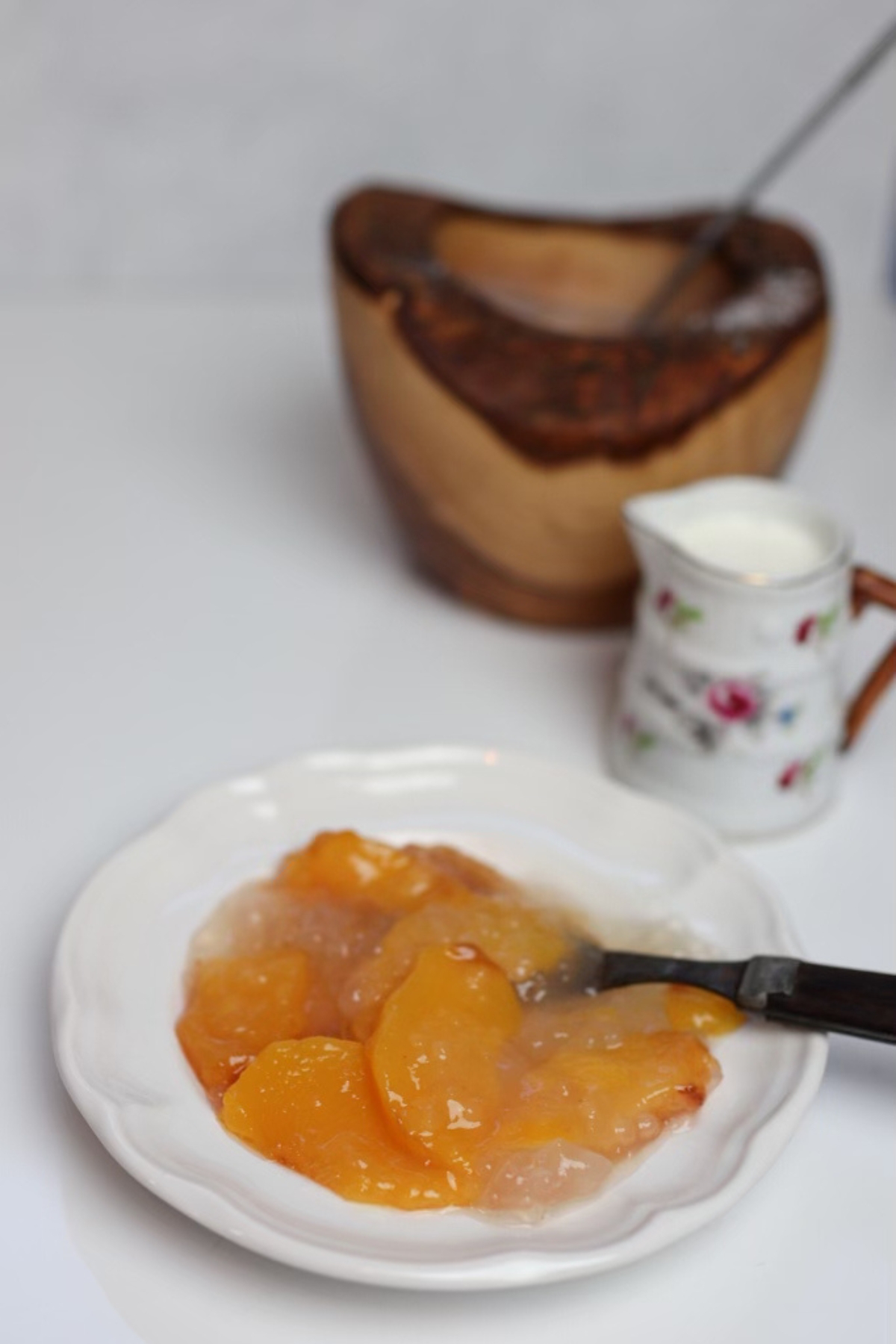 a dessert plate with peach tapioca pudding