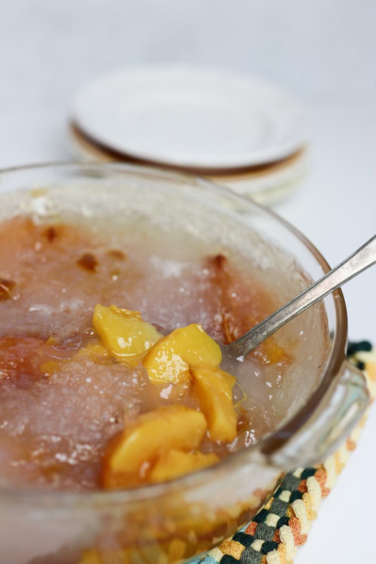 A dish of peach tapioca pudding, being served