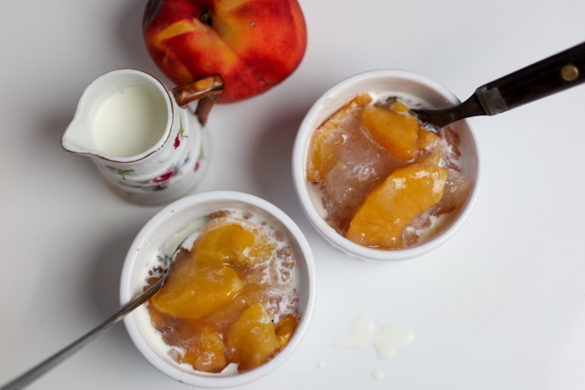 two small dishes of peach tapioca pudding